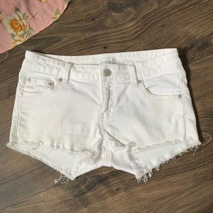 TALULA white jean cut off shorts size 28